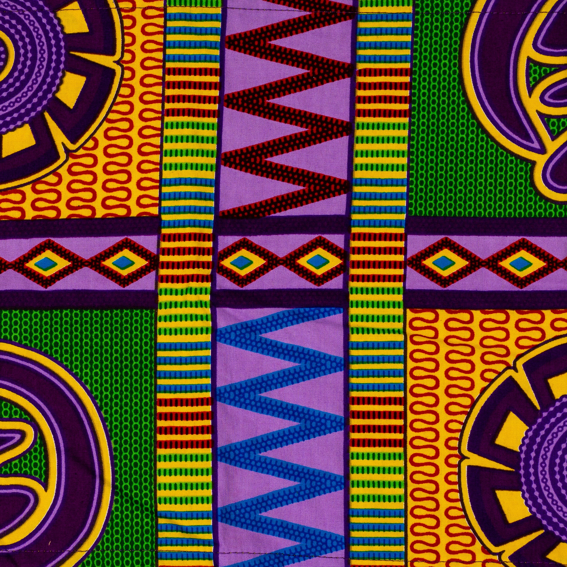 afrikai mintás színes csősál viselés adinkra